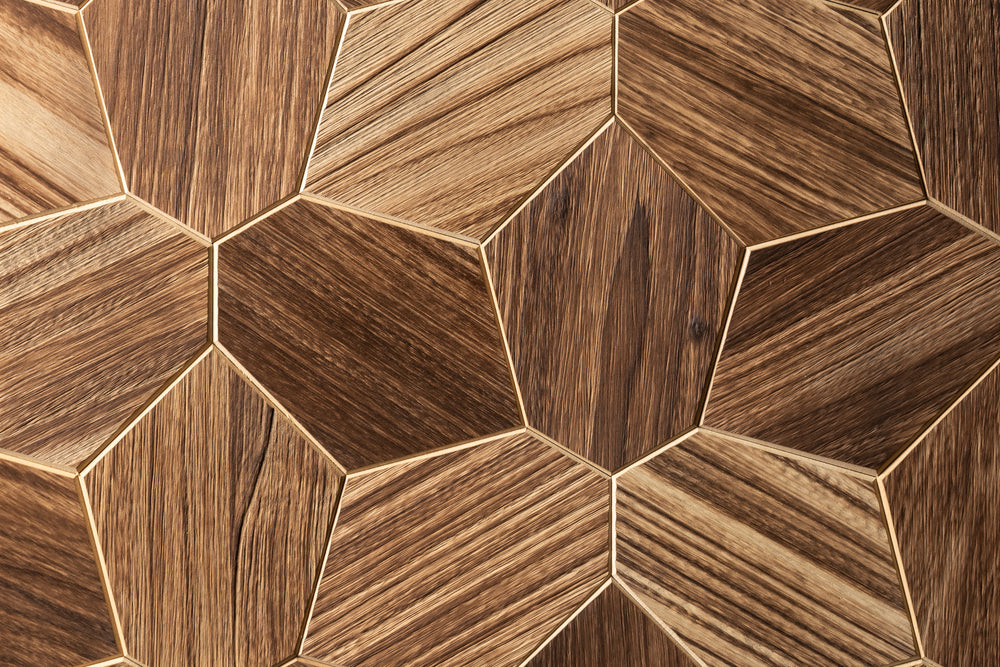 Hexagonal wooden tiles with a brown and beige pattern