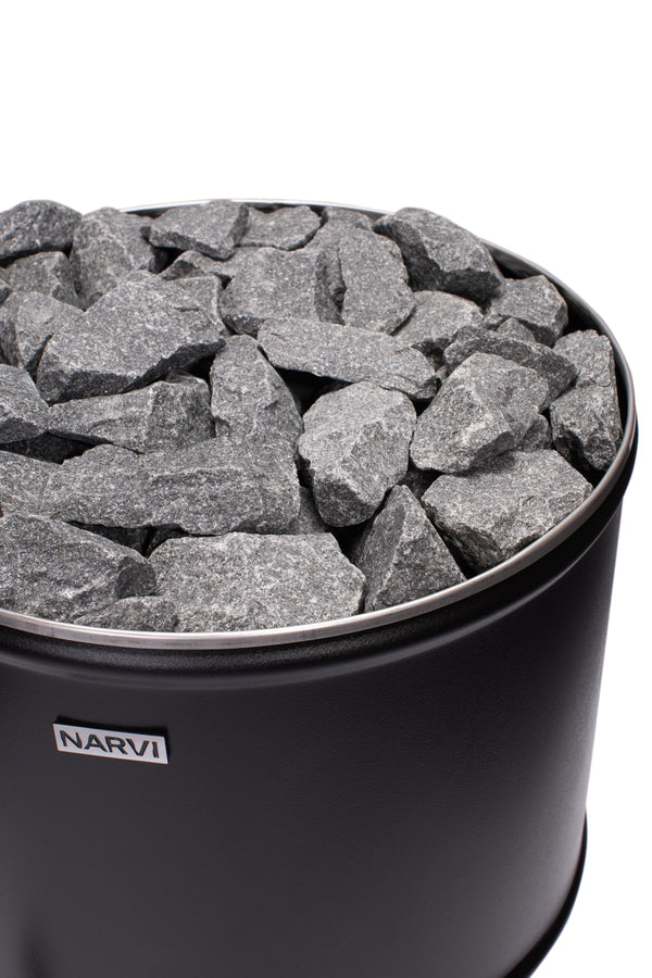 Black sauna heater filled with gray stones on a white background, featuring the Narvi brand.