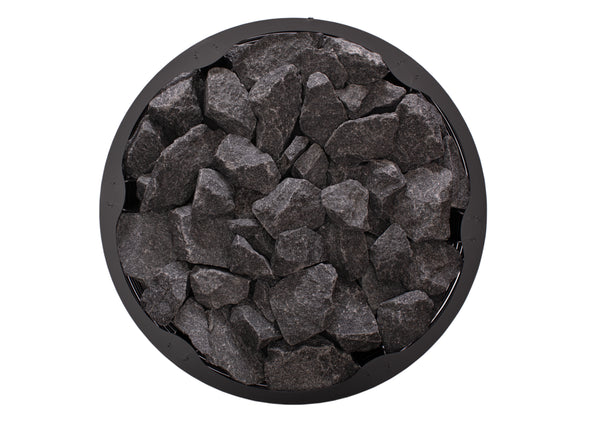 Narvi Inari Wood Burning Sauna Heater filled with grey sauna stones on a white background  