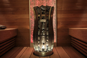 Decorative lamp with a unique design on a wooden surface in a warm-toned room.