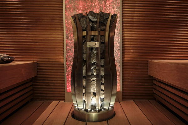 Decorative lamp with a unique design on a wooden surface in a warm-toned room.