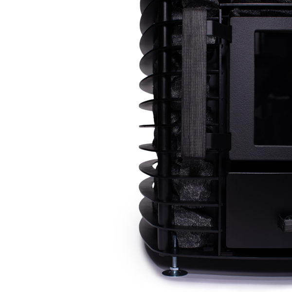 Narvi Velvet 20 Wood Burning Sauna Heater filled with grey sauna stones on a white background. 