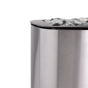 Narvi NC Wood Burning Sauna Heater filled with grey sauna stones on a white background