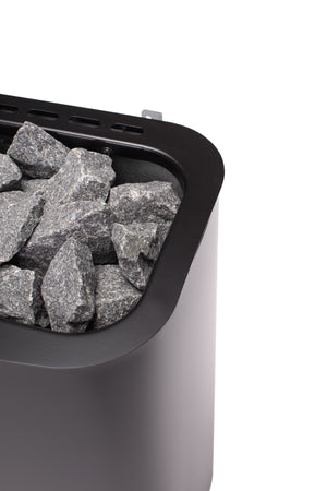 Narvi electric sauna heater filled with grey sauna stones on a white background 