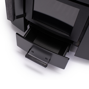 Narvi NC Wood Burning Sauna Heater filled with grey sauna stones on a white background