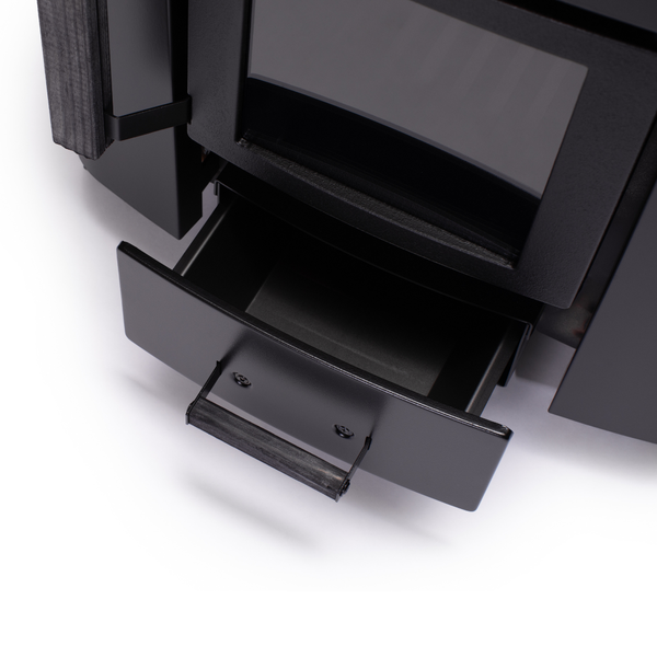 Narvi NC Wood Burning Sauna Heater filled with grey sauna stones on a white background