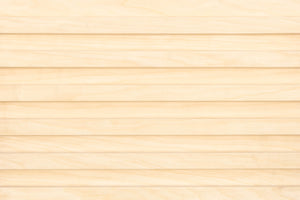 Close-up of a wooden surface with a light brown color.