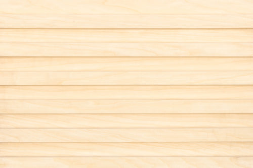Close-up of a wooden surface with a light brown color.