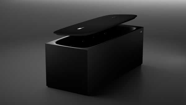 Black cold plunge with a lid on a dark background