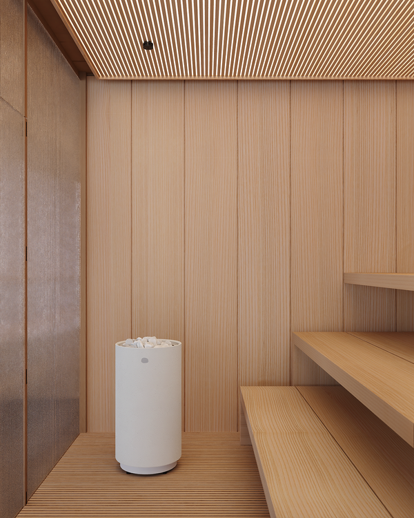 White electric sauna heater in a room with wooden walls and ceiling.