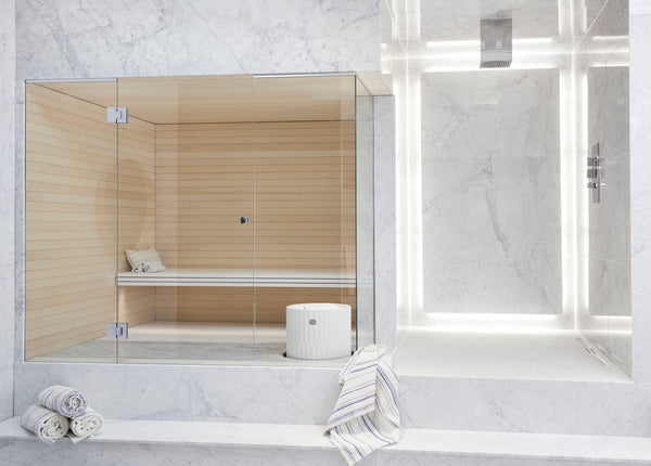 Round Standing Soapstone Cladded Electric Sauna Heater Tulikivi Riite Integrated In Sauna