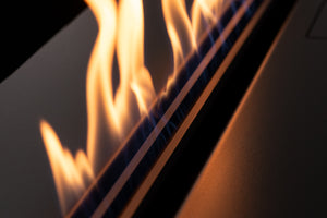 Detailed view of FLA4 linear ethanol flame with clean blue base and golden flame pattern