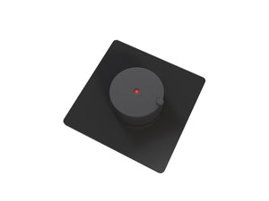 Black square electronic electric sauna heater control unit with circular component on a white background