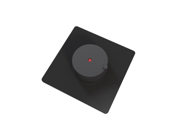 Black square electronic electric sauna heater control unit with circular component on a white background