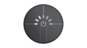 Round black control panel with power symbol on a white background
