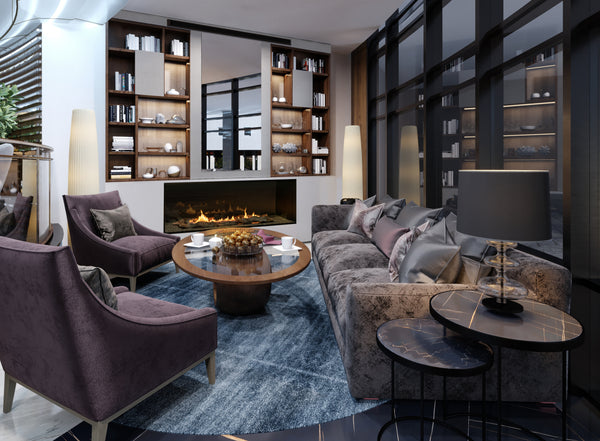 Modern living room with gray sofa, purple armchairs, and a fireplace.