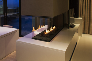Planika Panorama closed built-in ethanol fireplace installed as a room divider in contemporry home.
