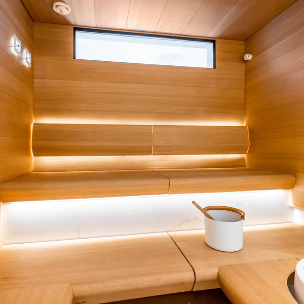Sauna Linear with a stove lens