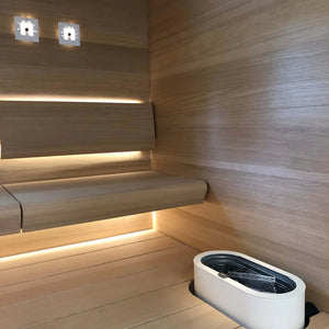 Sauna Linear with a stove lens