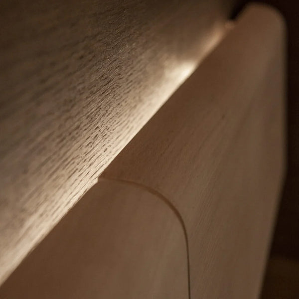 Sauna Linear with a stove lens