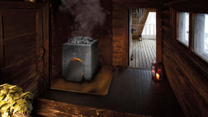 Gray brick-style Classic Smoke Sauna Oven in a wooden room