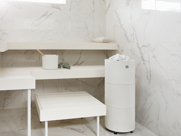 Round Standing Cast Stone Cladded Electric Sauna Heater Tulikivi Kuura 1 In Marmor Sauna With White Benches 
