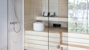 Round Standing Top Cast Stone Cladded Electric Sauna Heater Tulikivi Kuura 1 Integrated In Typical Finnish Sauna Boards