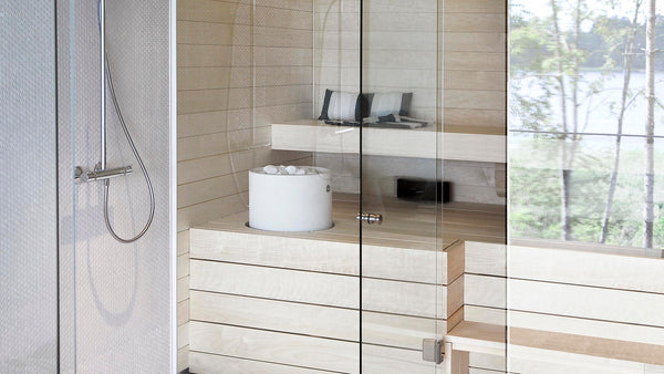 Round Standing Top Cast Stone Cladded Electric Sauna Heater Tulikivi Kuura 1 Integrated In Typical Finnish Sauna Boards