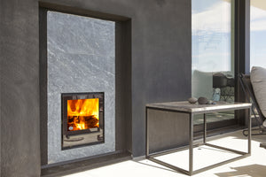 Modern wood burning sauna stove with a view of the outdoors