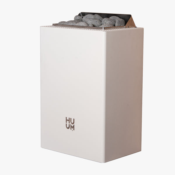 HUUM white electric sauna heater with grey stones inside on a white background  