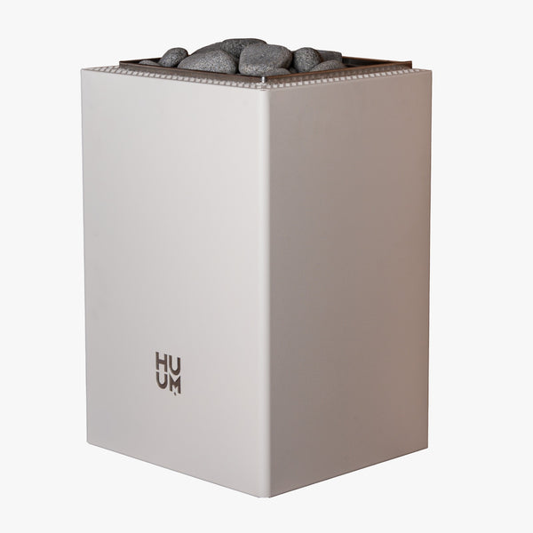 HUUM electric sauna heater with grey sauna stones on a white background 