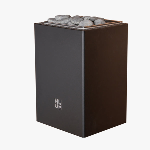 HUUM electric sauna heater with grey sauna stones on a white background 