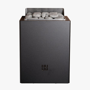 HUUM black electric sauna heater with grey stones on a white background