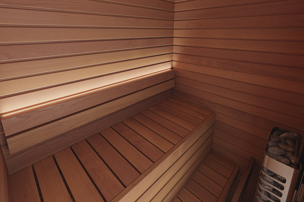 Wooden sauna with bench and heater