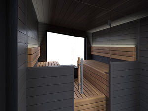 Modern sauna with wooden benches and dark wooden walls.