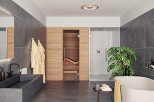 Modern bathroom with a sauna, bathtub, and plants