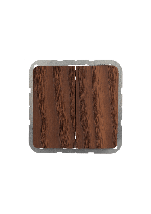 Wooden square coaster with metal rim on a light gray background