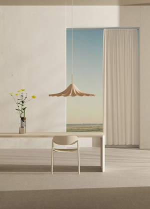 Modern interior with a table, chair, and decorative elements.