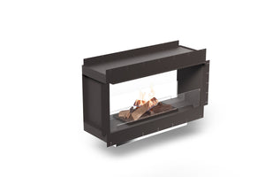 Modern freestanding fireplace with fire burning inside on a white background