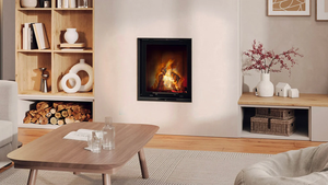 white minimal living room with fireplace, coffee table, and shelf