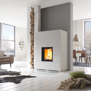 Modern white living room with Schmid fireplace as centre piece.