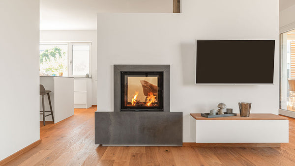 Modern living room with a fireplace and flat-screen TV.