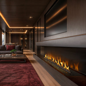 Modern living room with a large sectional sofa, coffee table, and fireplace.