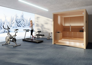 Modern home gym with exercise bike, treadmill, weights, and a wooden sauna.