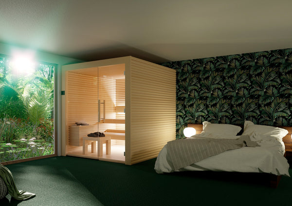 Modern bedroom with a wooden sauna-style room and leafy wall.