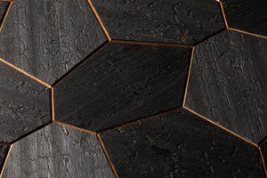 Hexagonal black tiles with a textured surface
