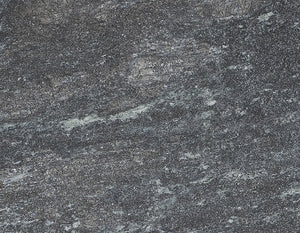 Close-up of a dark gray nobile soapstone surface with a speckled pattern