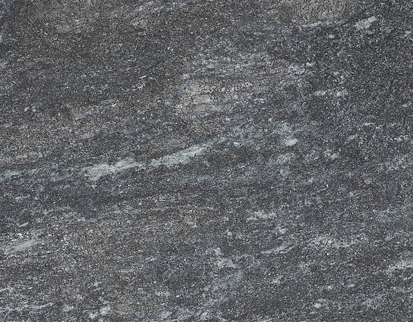 Close-up of a dark gray nobile soapstone surface with a speckled pattern