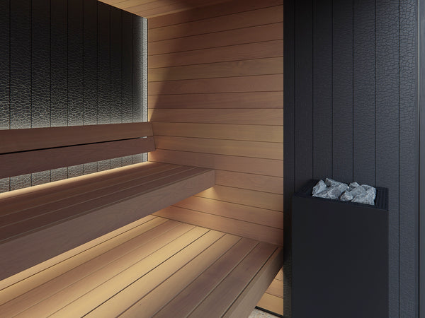 Wooden sauna interior with bench and stone shelf.